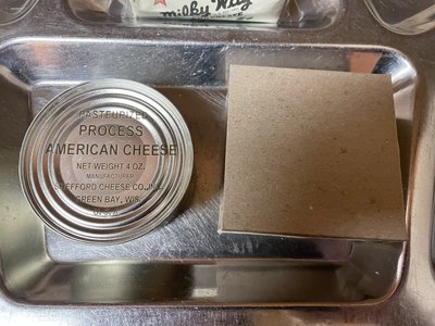 IMG_1188 - Copy.JPG (2.98 MiB) Viewed 70811 times The cheese was in the little cardboard sleeve. I noticed two things missing from this ration: a P-38 can opener and a small wooden spoon that should have been included. I'll give it a pass, I'm sure QC issues like this were common during the war anyway. ;)
