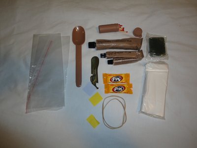 DSC00623.JPG (384.96 KiB) Viewed 7983 times Accesories, Modified spoon, chewing gum, matches, FRED zip lock bag, rubber bands, pre soaped scourer, plum jam, condensed milk vegemite and multi purpose paper napkins (shit tickets)