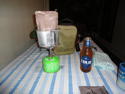 DSC00640.JPG (552.01 KiB) Viewed 7945 times Cooking on my trusty camp stove with part of beer ration