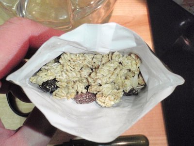 The opened bag of cereal flakes with fruit and honey - very likely - I love cereals! Ate them with some low fat milk! Great taste!