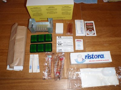 P2262109.JPG (198.45 KiB) Viewed 9293 times Breakfast box: 1 pack of Sweet biscuits (50g), orange and cherry jelly (30g), sugared concentrated milk (100g), instant coffee (1,8g), chocolate (25g), sugar (8g), Water purification tablets, 3 disposal toothbrushes, 1 box of matches, 3 toothpicks, 3 paper rubbish bags, 1 salt bag, 1 camp stove, 6 fuel bars, 2 paper napkins, 1 plastic spoon, 1 instruction sheet