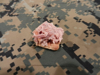 Very Good meat flavor, like a sauce-less meatloaf, or the filling from a stuffed pepper with no rice, or a type of meat loaf hash hybrid. Not spicy  or salty just taste whats in it, and that's good in this case , i want some more, anyone know where to get this in the USA?