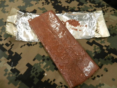 This was very good, a mix between a brownie and a fluffy layer of cake texture wise very soft and chewy, but not crumbly or dry in any way, nice rich chocolate flavor i think there were some nuts of some kind  also. This was better than the one for breakfast which was very good!