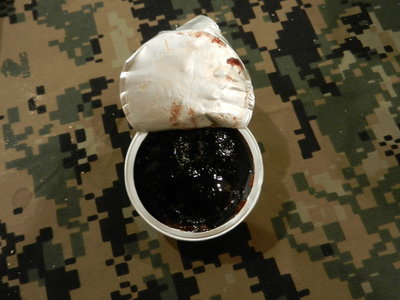 The tin was fine, there was some liquid but mostly a solid jelly