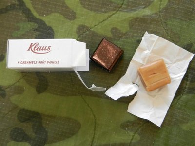 Single wrapped inside the box, a bit stiff, but softened after holding for a minute