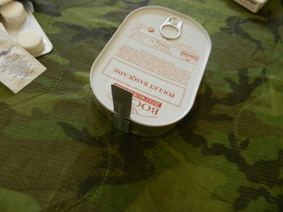 cool little can holder so you dont burn your fingers