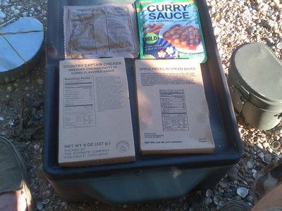 Pouch of Curry, Captains Chicken, Corn Bread and Apple slices