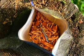 New MH with Ziploc seal. No O rings. Be sure to take out the packet that is inside to keep it dry....lol