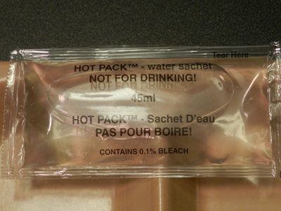 Hey that's neat, I've seen this in some Civilian US MRE's - little pack of water for your FRH