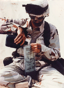A U.S. soldier uses a flameless ration heater.