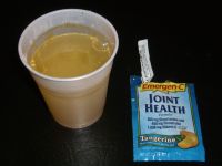 Emergen-C vitamin drink mix in water after