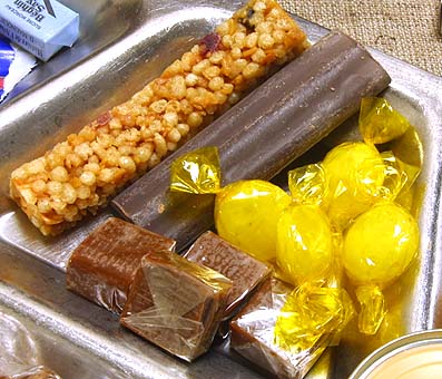French RCIR cereal bar, chocolate energy bar, lemon-flavored hard candy, and caramels